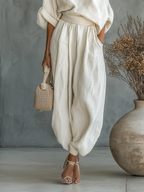 Mariella - Completo due pezzi con design a spalle scoperte