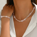 Ondina - Set Collana e Bracciale con Motivo a Coda di Pesce
